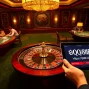 Experience thrilling gameplay at https://qq88.life/ with vibrant casino tables, poker chips, and roulette excitement.